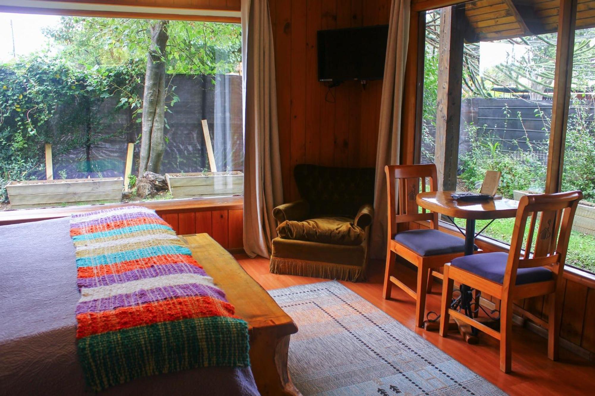 La Araucaria Hosteria Boutique - Ex Lounge Brasil Pucon Ruang foto