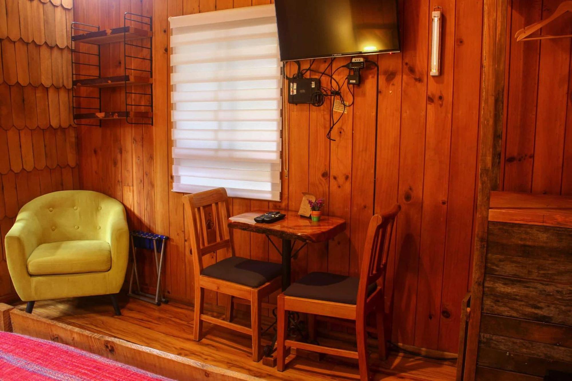 La Araucaria Hosteria Boutique - Ex Lounge Brasil Pucon Ruang foto